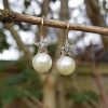 Victorian pearl earrings with a diamond adorned star