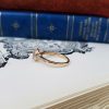 Morganite and diamond halo ring in a 9ct yellow gold setting