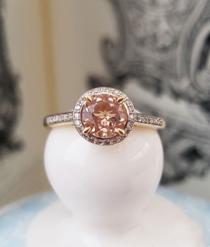 Morganite and diamond halo ring in a 9ct yellow gold setting