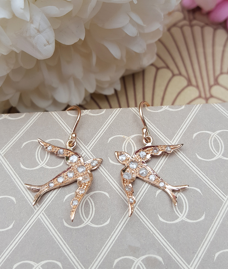 Gold swallow hotsell earrings