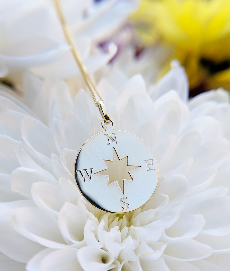9ct gold store compass pendant