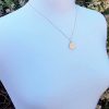 small st christopher medal with scalloped edges