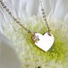 Mini heart necklace with a sparkling charm