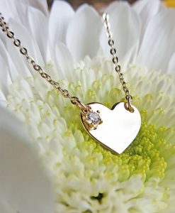 Mini heart necklace with a sparkling charm