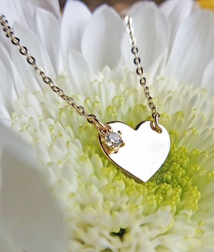 Mini heart necklace with a sparkling charm
