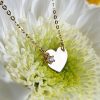 Mini heart necklace with a sparkling charm