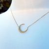 Crescent moon necklace in solid 9ct yellow gold with cubic zirconia