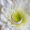 crescent moon necklace in solid 9ct yellow gold with cubic zirconia