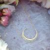 crescent moon necklace in solid 9ct yellow gold with cubic zirconia.