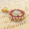 Vintage inspired floral shaped 14ct yellow gold Ruby and Opal Pendant