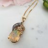 Nature inspired 14ct Yellow Gold Diamond and iredescent Opal necklace