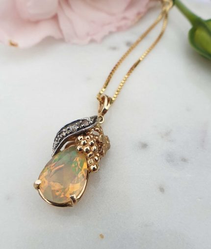 Nature inspired 14ct Yellow Gold Diamond and iredescent Opal necklace