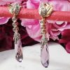 14ct yellow gold amethys drop earrings with diamonds. Post backs and butterflies