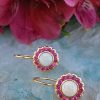 14ct yellow gold opal and ruby flower shaped drop earrings. Leaver back
