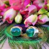Cabochon emerald earrings in 18ct white gold